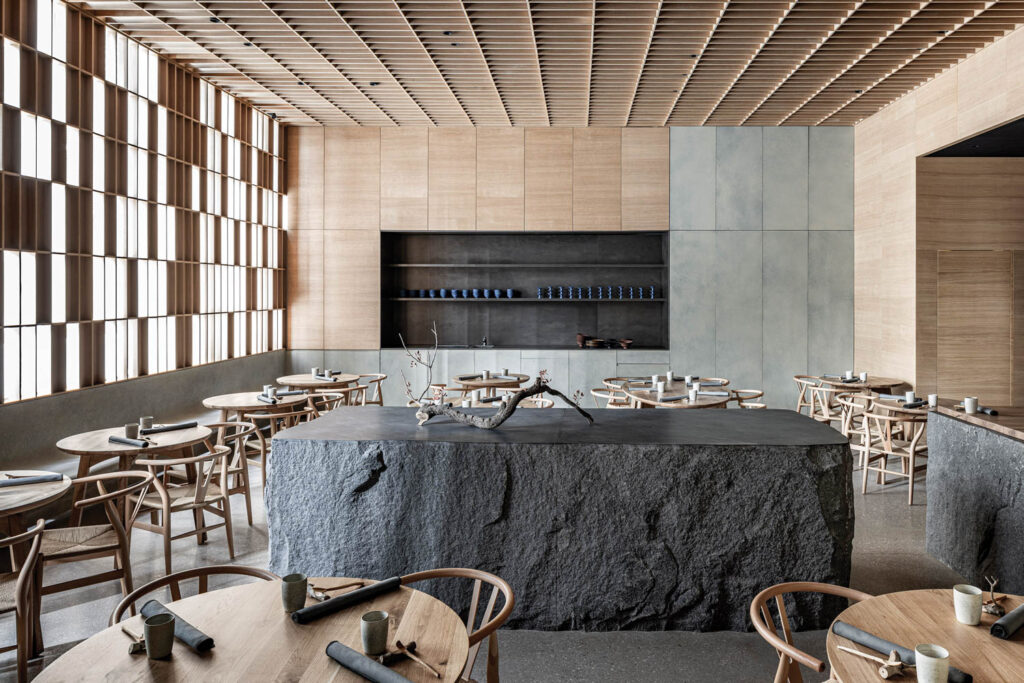 interior of restaurant with slatted ceiling and earthy furnishings