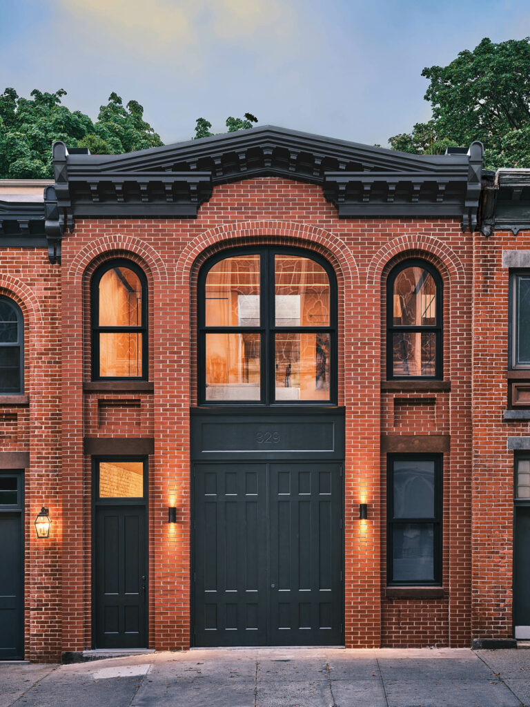 a historic brick facade with curved windows