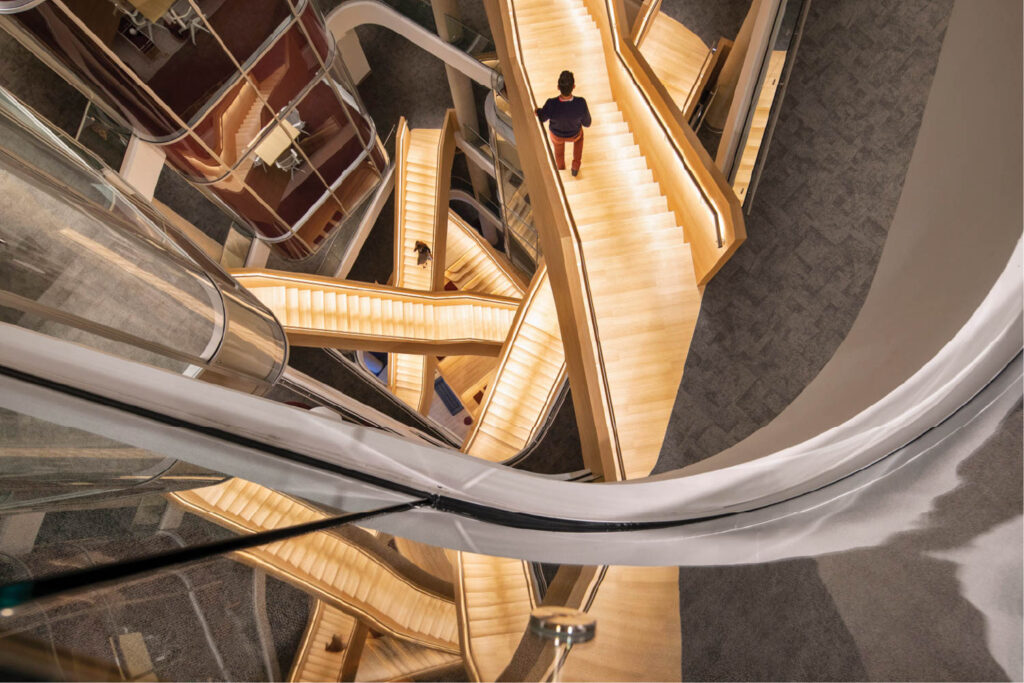 brightly lit crisscrossing stairs 