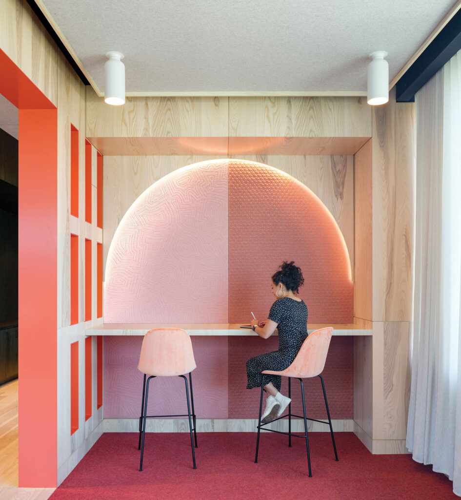 a workstation with pink accents in the LinkedIn Omaha, Nebraska office