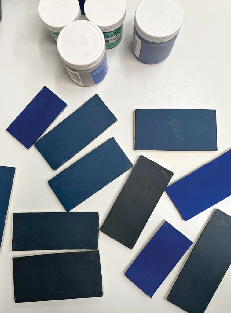 shades of blue and gray on ceramic rectangles