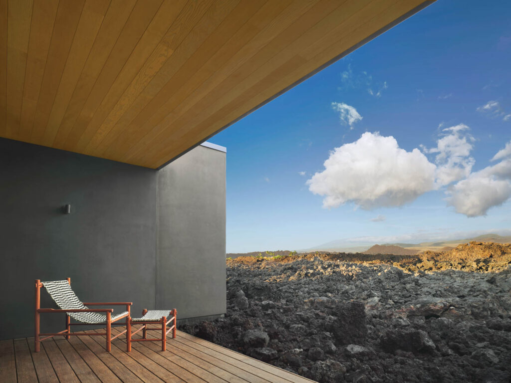 a resort balcony overlooking a lava field