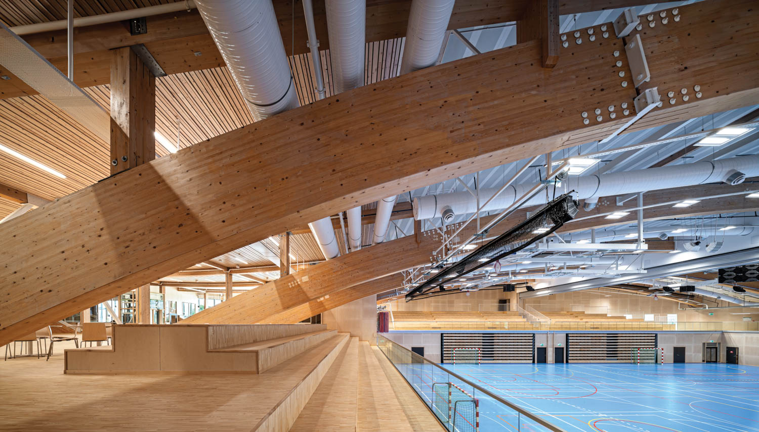 wooden bleachers facing the basketball court