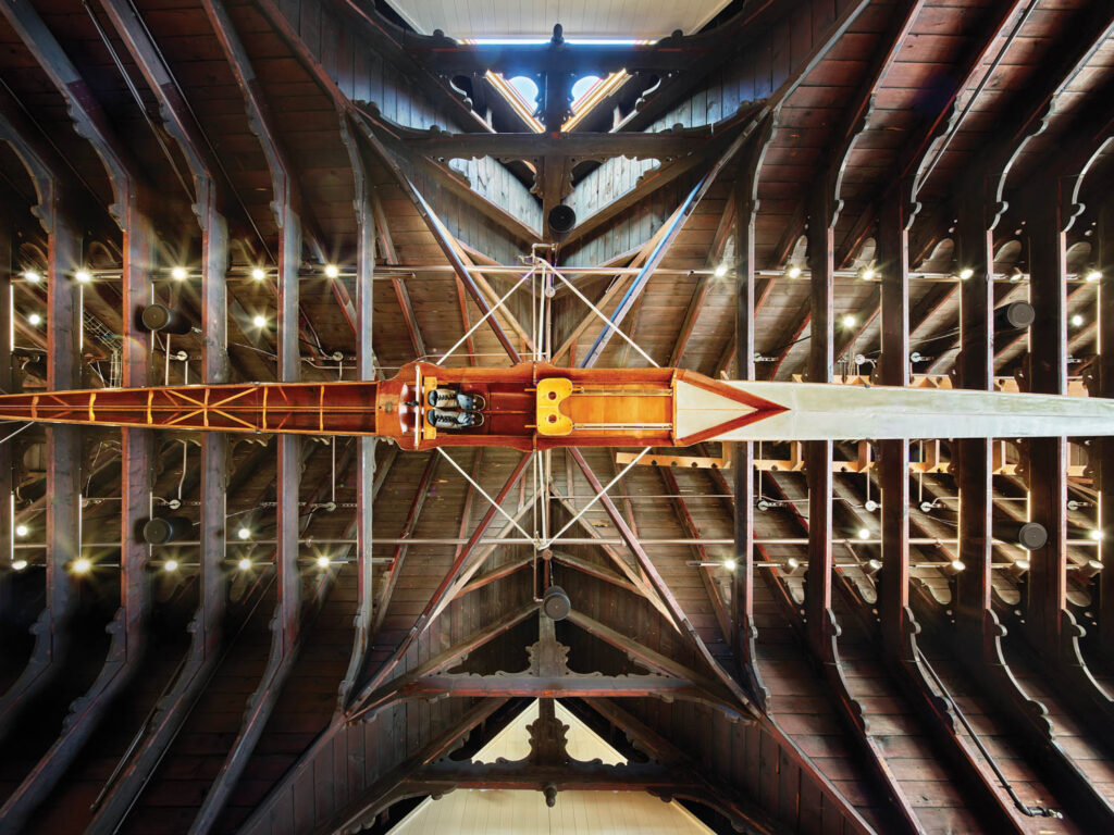 the ceiling of the UPenn Boathouse features the design of a crew boat