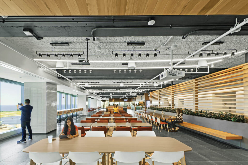 cafeteria with douglas fir slats and multiple dining tables and spaces