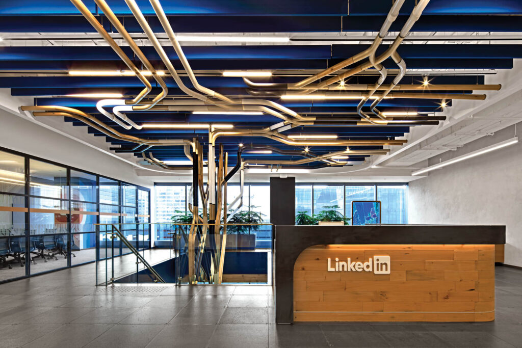 a treelinke sculptural installation made of metal that creates a canopy above the LinkedIn reception area
