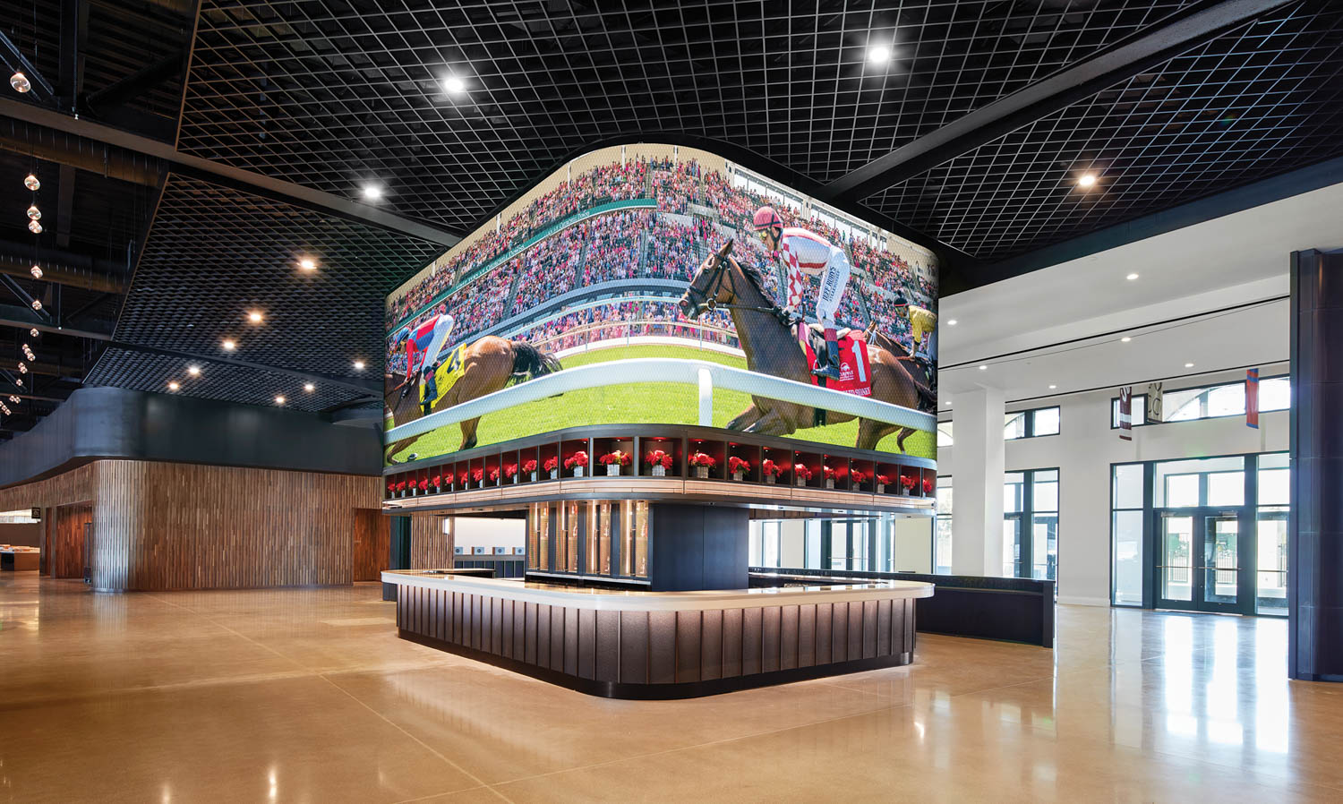 cube-like bar with tv screen in the middle of the workplace