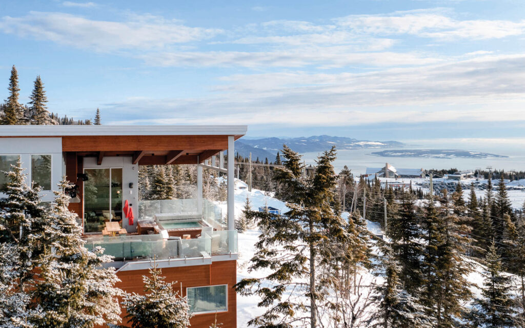 exterior facade of hotel with view of the snowy mountains