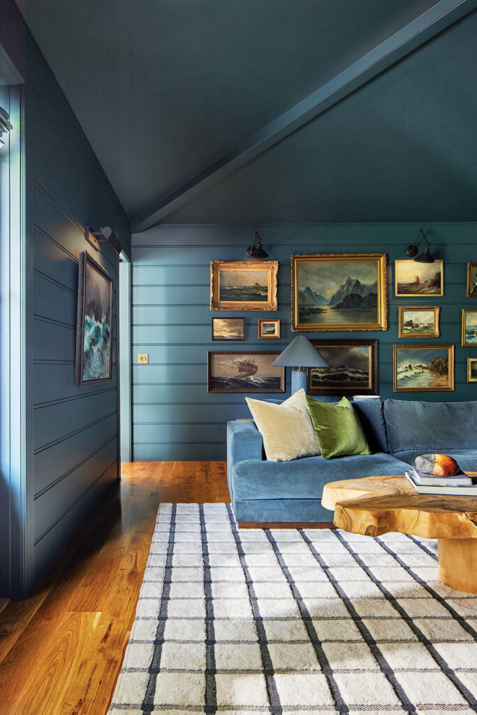 blue room with a grid-like rug
