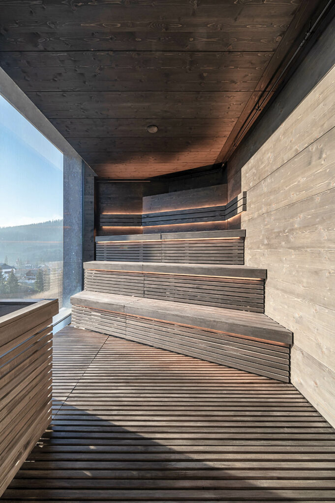 sauna wrapped with plywood stairs